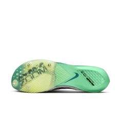 the nike zoom flyknit running shoe is shown in green and yellow colors