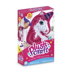 the plush craft kit is pink and white with a unicorn on it's head