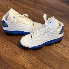 Air Jordan 13 Retro Bg Size: 6.5 Youth White / Hyper Royal-Black Release Date - 3/3/18 I Used To Work For Nike And Bought These On The Release Date In 2018. I Am The Original Owner And Only Wearer Of These Beauty’s. I Wear A Women’s Size 8 And These Fit Perfect. The Pair Is Practically Brand New And Has Been Kept In Excellent Condition - Always Placed Back In The Box After Wear And Original Supports Inside. All Jumpman Holographic Eyes Are Still Covered. I Did Not Wipe Off The Bottoms Before Pho Off My Face, Air Jordan 13 Retro, Jordan 13 Retro, Cute Nike Shoes, Tear Off, Cute Nikes, Jordan 13, Kids Jordans, Jordan Retro