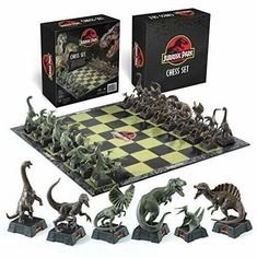 the dinosaur chess set is in its box and it's ready to be played