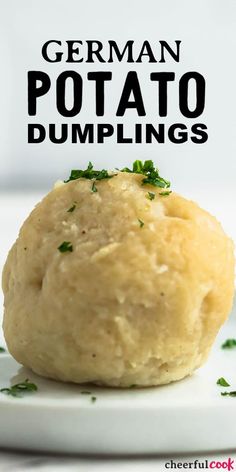 german potato dumplings on a white plate with parsley sprinkled on top