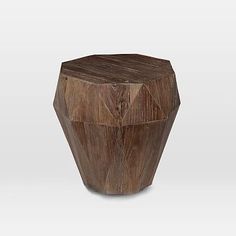 a wooden stool made out of wood with a diamond shaped design on the top and bottom