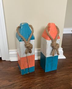 two wooden blocks with rope tied to them