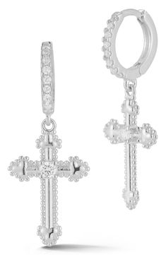 CZ accented crosses suspend from pavé accented huggie hoops plated in high-shine rhodium plate. 1 1/4" drop Hinge with snap-post closure Sterling silver/rhodium plate/cubic zirconia Made in Turkey Dangle Silver Earrings, Spring Handbags, Mom Beauty, Earrings Cross, Best Gifts For Mom, Mom Jewelry, Huggie Earrings, Luxury Gifts, Huggies Earrings