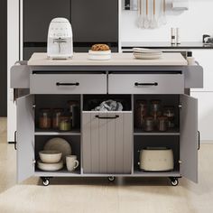 a kitchen island cart with food on it in the middle of a floored room