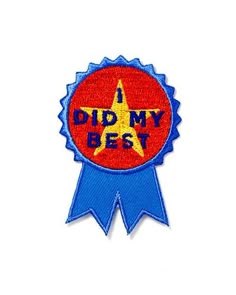 a badge with the words did my best on it and a blue ribbon around it