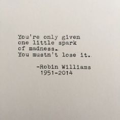 an old typewriter with the words you're only given one little spark of madness