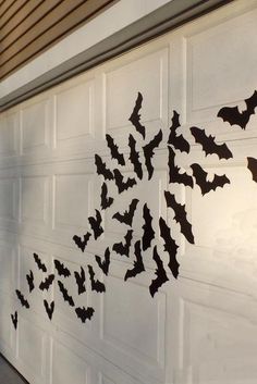 a garage door decorated with bats on it