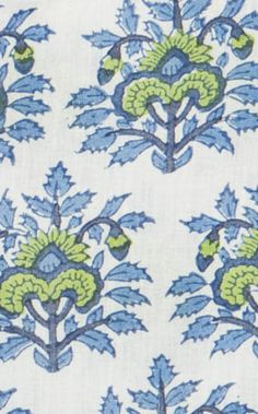 a blue and green floral pattern on white fabric