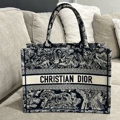 Christina Dior Medium Dior Book Tote Ecru And Blue Toile De Jouy Embroidery (36 X 27.5 X 16.5 Cm) Dior Aesthetic, Christian Dior Paris, Blue Toile, Book Tote Bag, Dior Book Tote, Embroidered Monogram, Chanel Deauville Tote Bag, Dior Bag, Satchel Bags