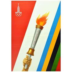 the olympic torch is being held by a hand with flames coming out of its end