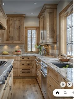 a kitchen with wooden cabinets and stainless steel appliances