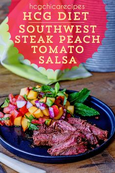 steak and vegetables on a blue plate with the words hg diet southwest steak tomato salsa