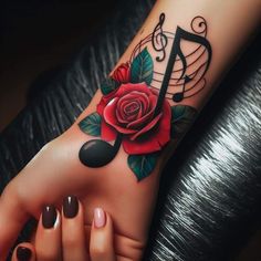 a woman's foot with a rose and musical note tattoo on the left side