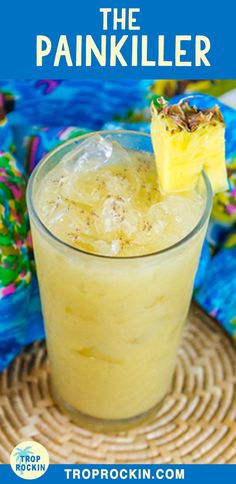 a drink with a slice of pineapple on the rim and text overlay that reads, how to make homemade pineapple punch in the pankiller