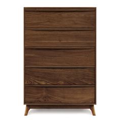 the chest of drawers is made out of wood