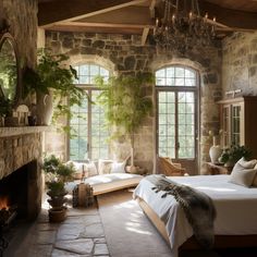 a bedroom with stone walls and flooring has a large bed in the middle, surrounded by greenery