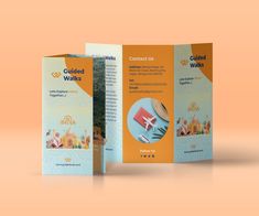 two fold brochures with an orange background