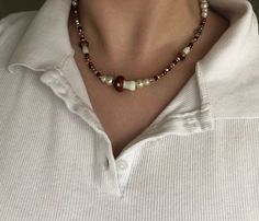 ✿ Mushroom Brown Trendy Necklace- cute little brown glass beads, glass pearls, brown mushrooms and a silver closure (tarnish resistant!) ✿ 𝐀𝐛𝐨𝐮𝐭 𝐭𝐡𝐞 𝐏𝐫𝐨𝐜𝐞𝐬𝐬 I buy beads and wire from locally sourced bead shops (including handmade glass beads) and then design and string all the necklaces. 𝐒𝐢𝐳𝐢𝐧𝐠 The sizes I offer currently are 16inch to 20 inch, however, I offer extended sizing to those who would prefer it; just place that information in the custom tab or send me a message :) Nature-inspired Brown Beaded Necklaces, Fairycore Adjustable Beaded Necklaces, Handmade Brown Glass Necklaces, Fairy Core Beaded Necklace, Brown Mushroom Necklace, Brown Mushroom, Buy Bead, Handmade Glass Beads, Trendy Necklaces