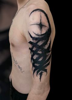 a man with a tattoo on his arm