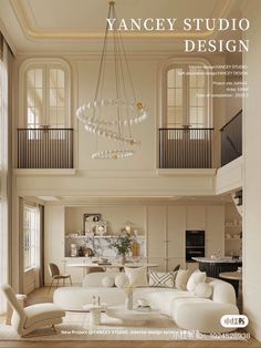 a living room filled with furniture and a chandelier hanging from the ceiling above it