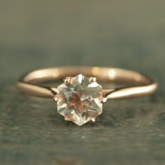 an engagement ring with a white diamond in the center