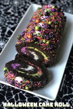 halloween cake roll on a plate with sprinkles