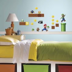 a bed room with a neatly made bed and mario bros wall decals