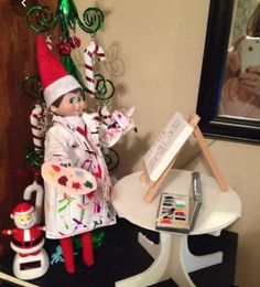 an elf is sitting on top of a table