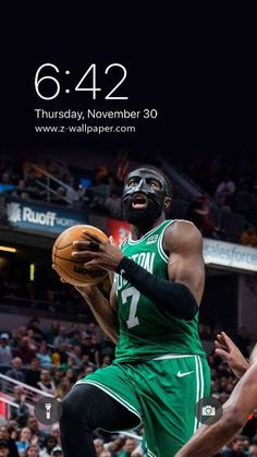 a man with a mask on holding a basketball