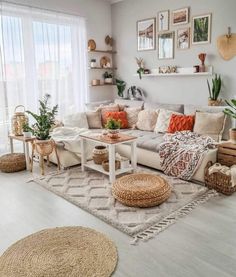 a living room filled with lots of furniture and decor