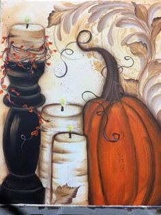 a painting with candles and pumpkins on it