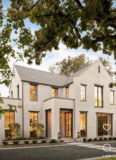 a large white house with lots of windows