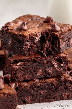 chocolate brownies stacked on top of each other