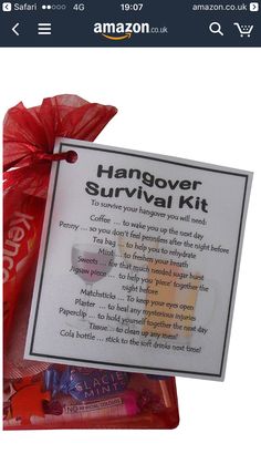 the hangover survival kit is being displayed on an amazon gift card and wrapped in red ribbon