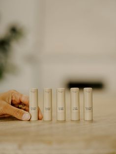 Try all five of our nutrient-dense, delicious + organic lip balms rich in healthy fats and healing oils to help moisturize, minimize inflammation and provide long-lasting relief for dry, irritated or chapped lips. Peppermint, creamsicle, lavender, grapefruit and cocoa complete this lip set. Our bags are ethically made with organic cotton at a fair trade facility in India. Lip Balm .15oz = 0.126 oz actual fill Lip Balm Aesthetic, Primally Pure, Lip Balm Packaging, Peppermint Lip Balm, Lip Balm Set, Organic Lip Balm, Healing Oils, Lip Set, Chapped Lips