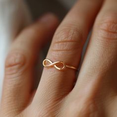 14k Gold Plain Infinity Ring, Infinity Symbol Gemstone Ring, Unique Gold Infinity Ring, Infinity Love Band Ring, Gold Iconic Infinity Ring 🌺Item Detail🌺 ♠️ Item Name : Infinity Ring ♠️ Metal : 925 Silver  ♠️ Size : Select the Variations                                                                           🌊 *About Us: Natural World Jewelry* 🐚 At Natural World Jewelry, we're passionate about bringing the serene beauty of the ocean to your everyday life. Our artisanal jewelry pieces are lo Gold Infinity Ring, Infinity Love, Love Band, Infinity Ring, Infinity Symbol, Unique Beauty, Ring Metal, Ring Unique, Flower Ring