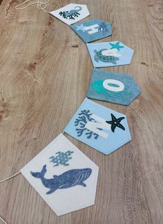 the table is made up of several hexagons with sea animals on them