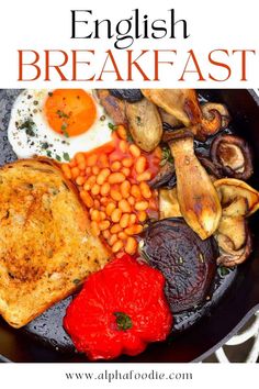 an english breakfast with eggs, beans and tomatoes in a skillet on the stove