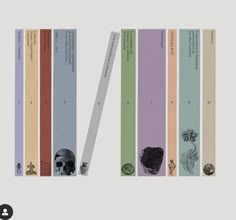 the bookmarks are lined up with different types of books on them, and each one has an image of a human skull