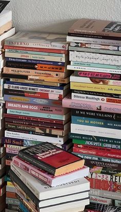 a stack of books sitting on top of each other