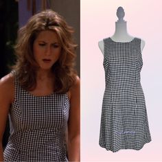 the young woman is wearing a black and white checkered dress