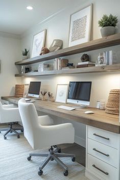 a home office with two computer screens on the desk and chairs in front of it