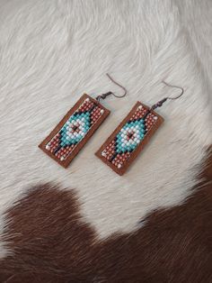 Made with glass beads and genuine leather. Handwoven design.  Handmade in North Texas. Thank you for supporting our small business! Beaded Leather Earrings, Native American Earrings Beadwork, Loom Beaded Earrings, Southwestern Design Patterns, Native American Beadwork Earrings, Beaded Earrings Native American, Diy Things To Make, Brick Stitch Patterns, Seed Bead Projects