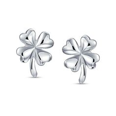 A charming symbol of luck, these clover stud earrings are sure to be worn often. Created in sterling silver, each earring features a puffed four-leaf clover design. Polished to a bright shine, these post earrings secure comfortably with friction backs. Classic Silver Flower Earrings, Symbol Of Luck, Clover Design, Valentine Day Special, Four Leaves, Four Leaf, Leaf Clover, Four Leaf Clover, Sterling Silver Earrings Studs