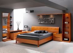 a bed room with a neatly made bed and shelves