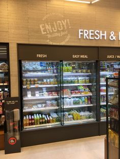 an empty grocery store filled with fresh and frozen food