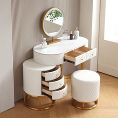 a white vanity with stool and mirror on the wall next to it in a room