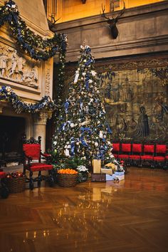 a decorated christmas tree in the middle of a room