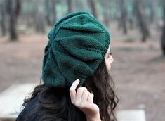 A hand knit beret with a ribbed band adds an extra dimension of warmth and texture to your look.I knitted this slouchy beanie hat with a emerald Green color yarn. Put the perfect fall touch to any clothes with this Adult beanie knit hat. So adorable to wear for the winter season! A perfect gift for any teens and adults.It fits to an average head like 20-23 inches.Material : In this project, I used 50% Acrylic - 50 % wool yarn. Color : Emerald green  You can add another color of this hat in this Hand-knitted Hat As Gift, Handmade Casual Beanie As Gift, Hand Knitted Beanie Gift, Hand Knitted Beanie One Size As Gift, Handmade Beanie, One Size Fits Most, Handmade Beanie One Size - Perfect Gift, Casual Hand Knitted Beret For Winter, Handmade Green Beanie For Winter, Handmade Casual Beret One Size